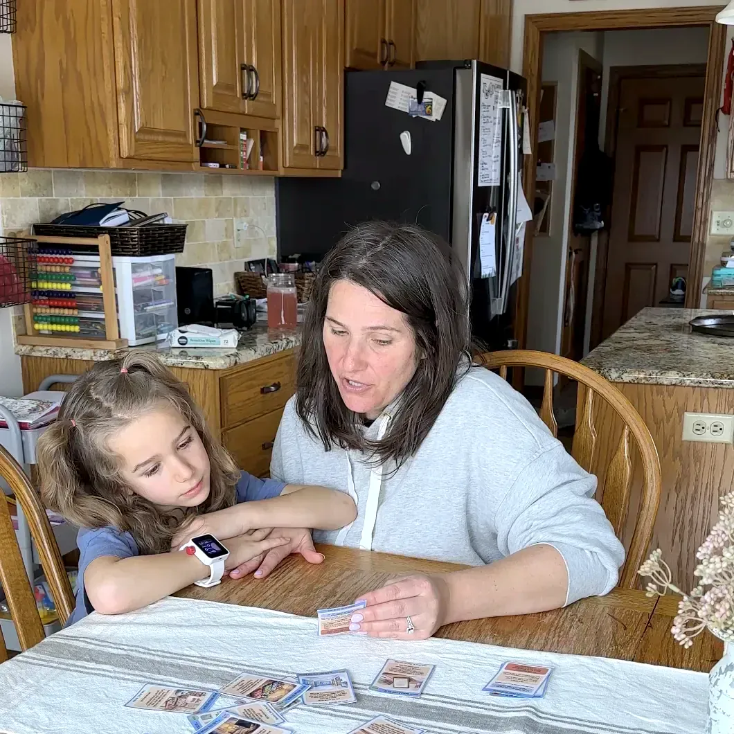 Parent and child using a Trailies card together