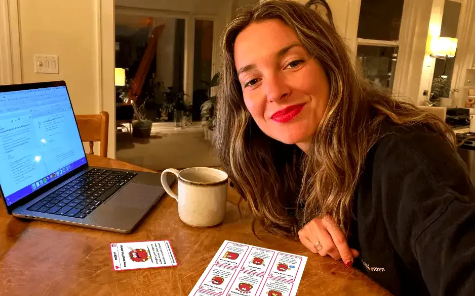 A professional reviewing Trailies card sheets at her desk
