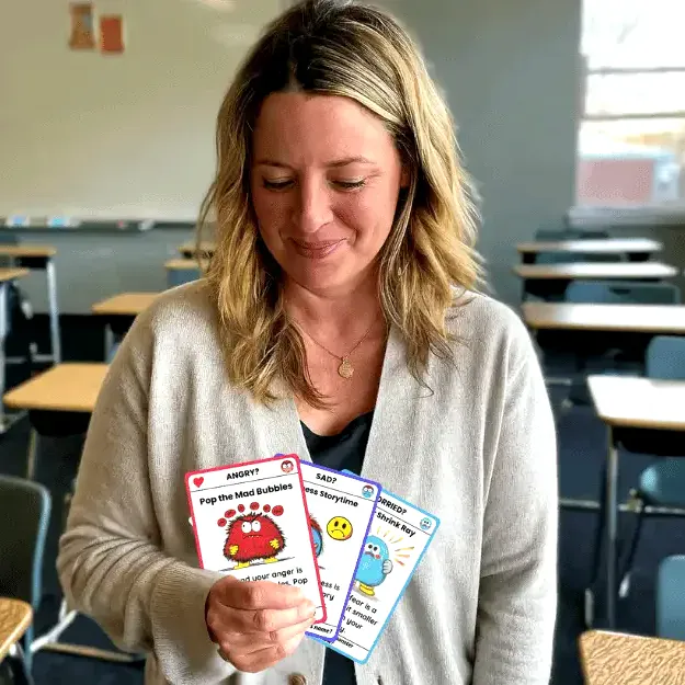 A therapist on the Trailies review panel reading through the cards